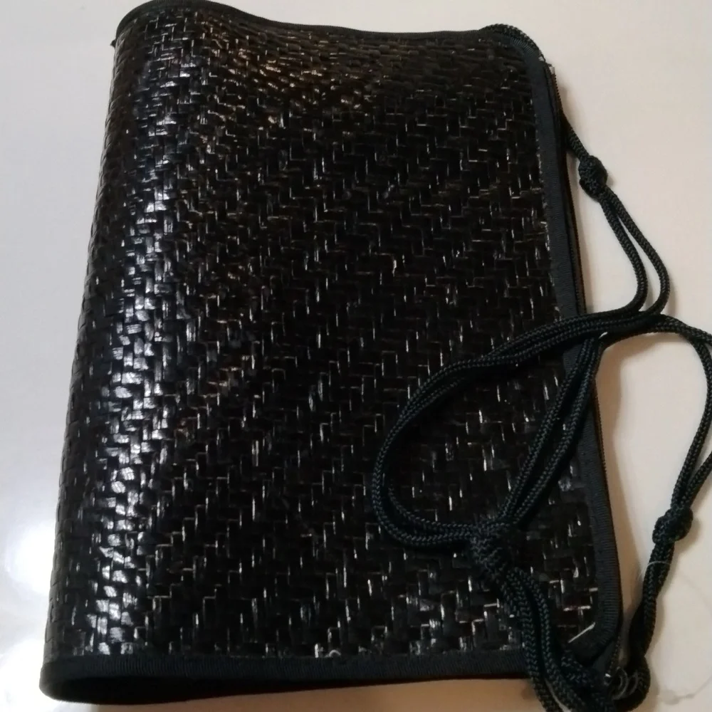 Made in Hong Kong black woven clutch